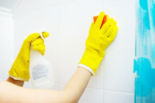 Room-by-room house cleaning in a bright living space